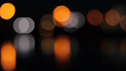 Night lights on the sea bokeh, reflection of the night sky in the water, boke Video stock 128450264
