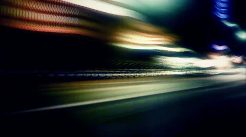 Night lights streak as we travel down a city street - Street Lights 1001 HD, 4K Stock Footage