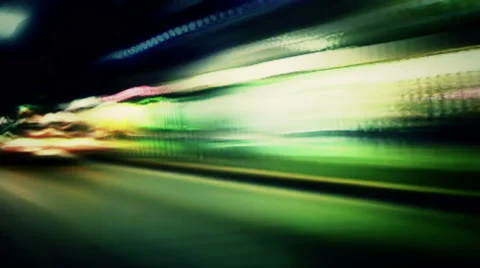 Night lights streak as we travel down a city street - Street Lights 1003 HD, 4K Stock Footage