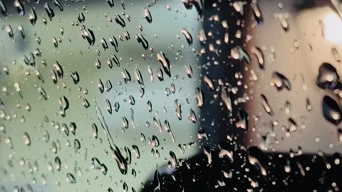 Night lines of rain drops on glass of window, evening bokeh Stock Footage 270217934