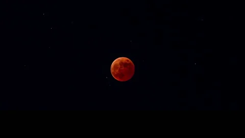Night lunar eclipse space nature light dark full universe blood science planet Video stock 233570736