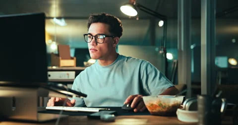 Night, man and eating at computer for programming, web development and project Stock Footage 301391744