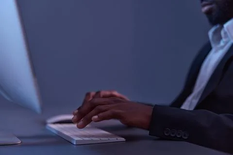 Night man computer freelancer online work business american keyboard lifestyle Stock Photos