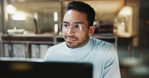 Night, man or smile with computer in office for breaking news, story editing or Stock Photos