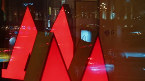 Night metro sign throw reflection of the windows with unrecognized busy crowded Video stock 257697616