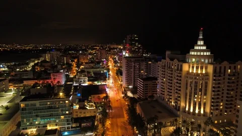 Night in Miami Iconic deco hotels on Collins Avenue Stock Footage