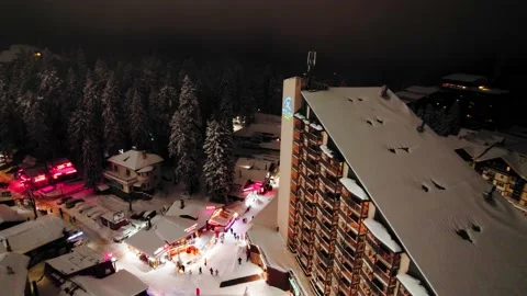Night Mist Ski Resort Neon Circle Reveal Big Hotel Slopes Winter Borovets Europe Video stock 235360053
