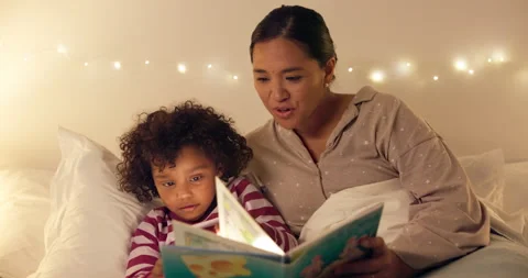 Night, mom or reading with child for bedtime story, fantasy or imagination Stock Footage 335293794