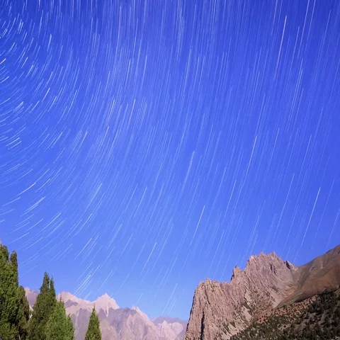 Night in the mountains. Traces of stars similar to metory. TimeLapse. Pamir, Stock Footage