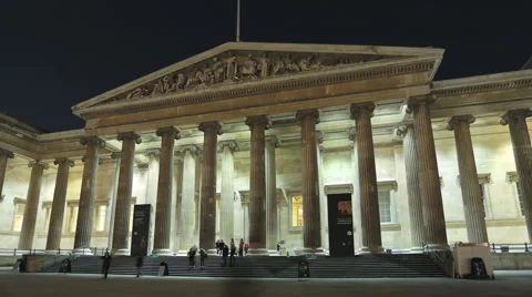 Night at the Museum: time-lapse zoom of people at British Museum, London Stock Footage 57344906