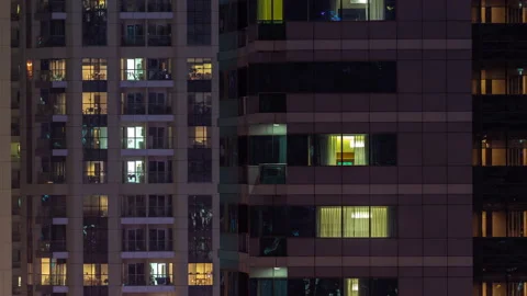 Night night view of multicolor light in windows of multistory buildings aerial Vídeos de archivo 225277742