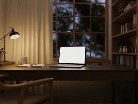 Night office desk with blank screen laptop, reading lamp, coffee mug and no.. Stock Illustration