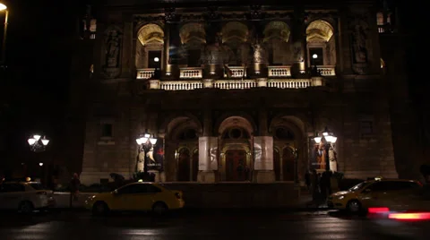 NIGHT OPERA BUILDING 4 PEOPLE CARS Stock Footage 39385277