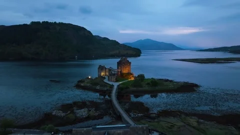 Night over Eilean Donan Castle and Loch Duich from a drone, Highlands, Scotland 스톡 동영상 308422822