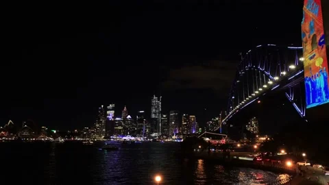 Night over Sydney harbour bridge with bright light at Vivid Sydney as 4k. Stock Footage 229248925