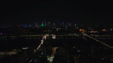 Night overall view with Vistula River centered, slight rotation, Warsaw 스톡 동영상 339176547