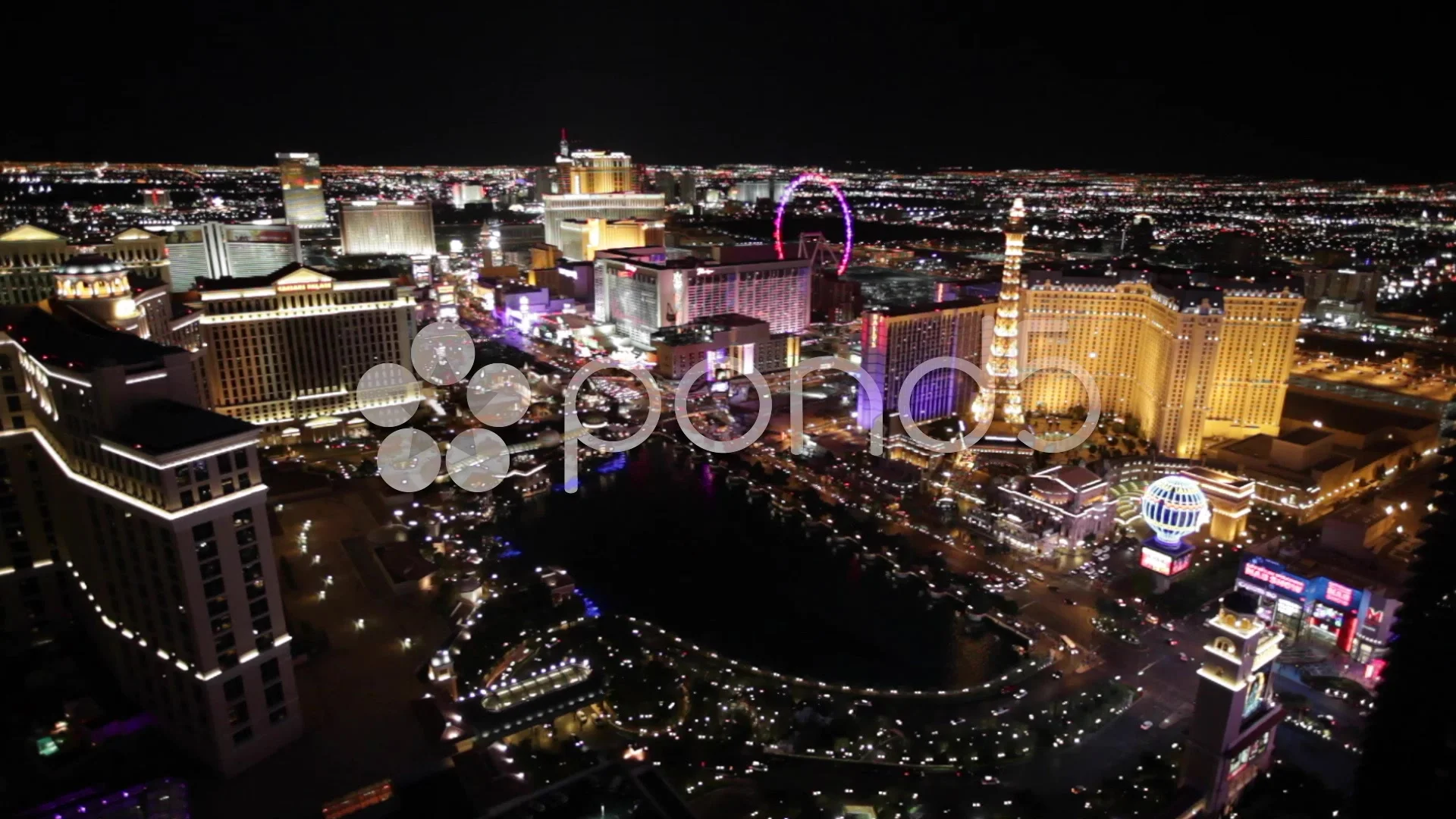 View of Paris Las Vegas and Bellagio Hotel & Casino at night Stock