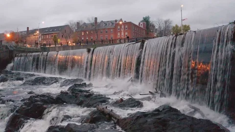 Night Pan Up Drone Shot Over Waterfall In Downtown Dover New Hampshire Video stock 128193435
