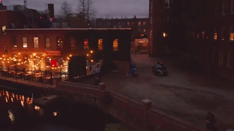 Night Pan Drone Shot Over Outside Restaurant Bar In Downtown Dover New Hampshire Video stock 128193652