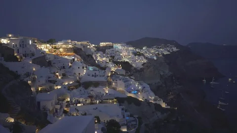 Night pan to the left of the main town of fira on santorini Stock Footage 72695639