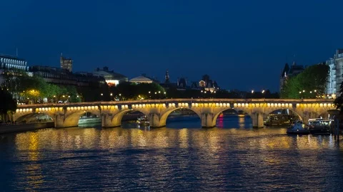 Night panoramic view of the Seine river, Site island and Neuf bridge Stock Footage 108264273