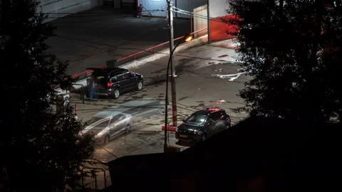 Night parking 24 hours working. Car drivers wash nd repair their auto taking Video stock 118399811