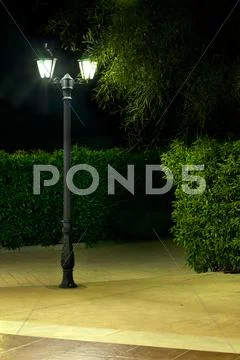 Night picture of the lamp in the park Stock Photos