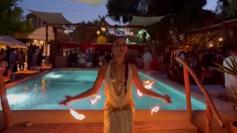 Night Pool Club Fire Dancer Performing with Symmetric Movements and Crystal Видео 327392030
