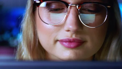 Night, programming and woman in workplace, glasses for clear vision and 스톡 동영상 331192032