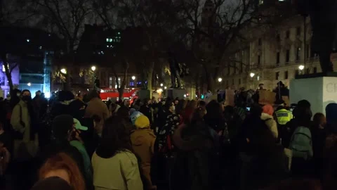 NIGHT PROTESTERS YELL 'WHO DO YOU PROTECT, WHO DO YOU SERVE' UK 4K Stock Footage 150400955