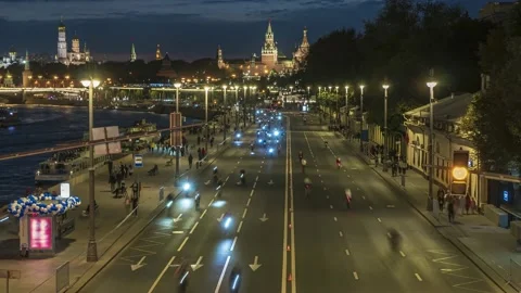 Night race of cyclists through the Central streets of the city,time lapse Stock Footage 146840615