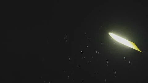 Night rain in the light of a lantern. Stock Footage 315787265