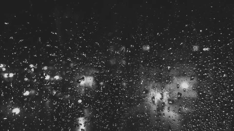 Night raindrops on window close up black and white 4K Stock Footage 125342818
