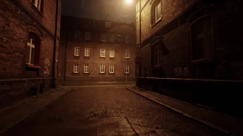 Night Rainfall: Dark Streets of a Neglected City Stock Footage 243574044