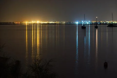 Night reflections over Ilha do Farol in Faro Fotos Stock