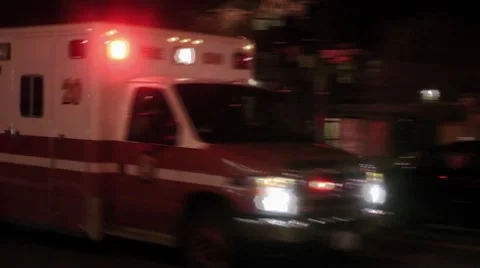 Night response - EMS approach &amp;amp; passes, stock footage Stock Footage 10803453
