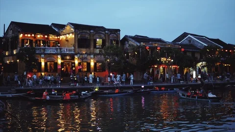 Night river Thu Bon view with floating lanterns and boats. Hoi An, once known as Stock Footage 92561156