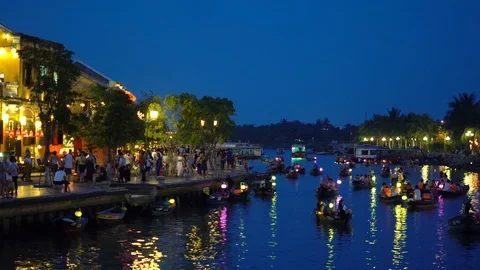 Night river view with floating lanterns and boats Stock Footage 90178328