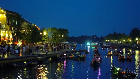 Night river view with floating lanterns and boats Stock Footage 90180745