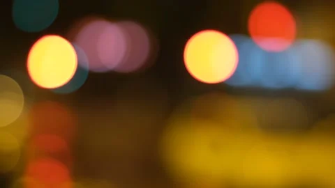 Night road lights blurred bokeh of cars in traffic on the road at night. Stock Footage 162736339