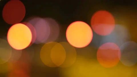 Night road lights blurred bokeh of cars in traffic on the road at night. Stock Footage 162736382