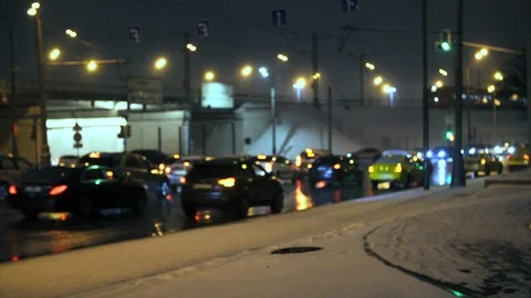 Night road traffic on the background of a fast moving train. Blurred Street Scen Stockbeeldmateriaal 104408563