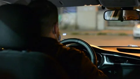 Night road. View from inside car. Natural light. Street and other cars is motion Stock Footage 147057075