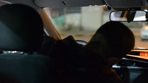 Night road. View from inside car. Natural light. Street and other cars is motion Stock Footage 147057091