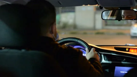 Night road. View from inside car. Natural light. Street and other cars is motion Stock Footage 147057114