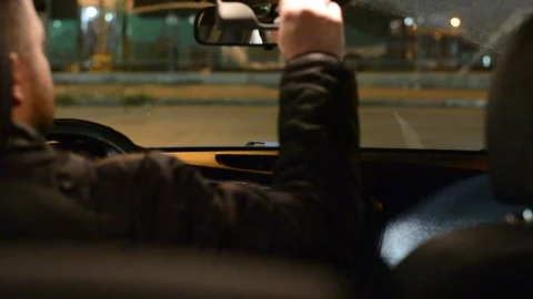 Night road. View from inside car. Natural light. Street and other cars is motion Stock Footage 147057250