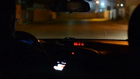 Night road. View from inside car. Natural light. Street and other cars is motion Stockbeeldmateriaal 147057437