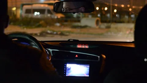 Night road. View from inside car. Natural light. Street and other cars is motion Stockbeeldmateriaal 147057463