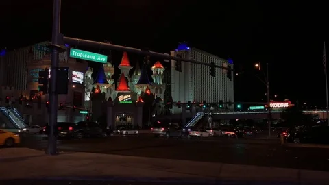Night roadside on Tropicana Ave intersection in Las Vegas Stock Footage 84014660