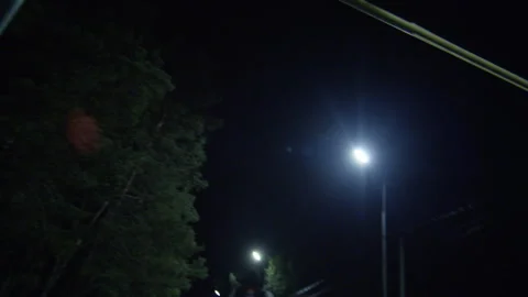 Night Run — Young Athlete on Empty Street Stock Footage 314644210